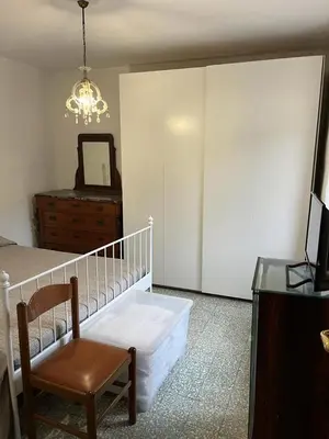 Letto o letti in una camera di LevantoTwo bedrooms Flat with terrace