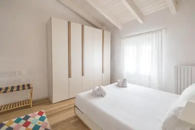 Letto o letti in una camera di Mansarda del Duca