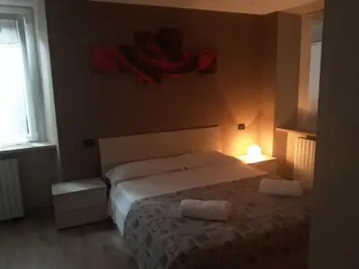Letto o letti in una camera di Il mio hotel