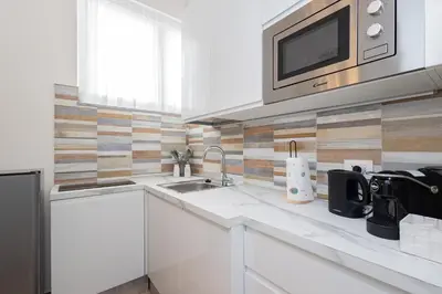 Cucina o angolo cottura di Università & Strada Nuova - Lovely Suite Scaldasole