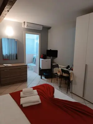 Letto o letti in una camera di Camera IN