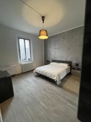 Letto o letti in una camera di Suite Storchi - Apartment near downtown