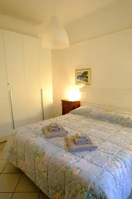 Letto o letti in una camera di Secret Garden by PortofinoVacanze