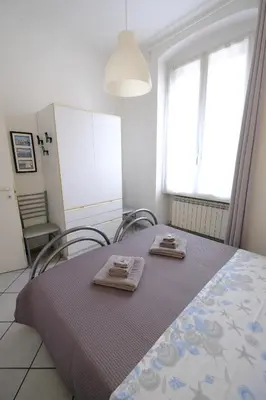 Letto o letti in una camera di Secret Garden by PortofinoVacanze