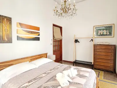 Letto o letti in una camera di La Bomboniera