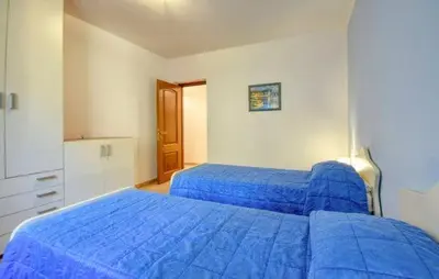 Letto o letti in una camera di Casa L'uliveto