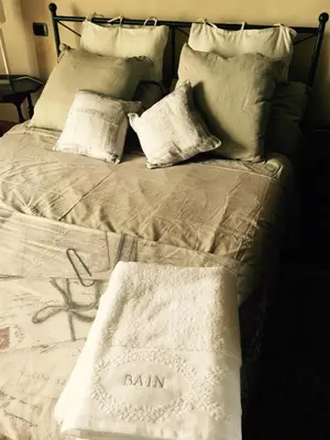 Letto o letti in una camera di B&b Villa Partitore