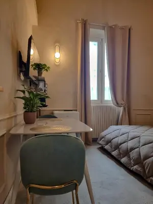 Letto o letti in una camera di Matteotti 54 Dimora Storica