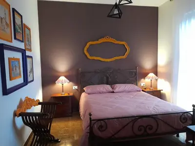 Letto o letti in una camera di La casa di Giuly