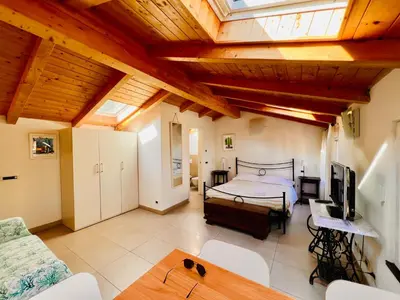 Letto o letti in una camera di Affittacamere Le Caravelle