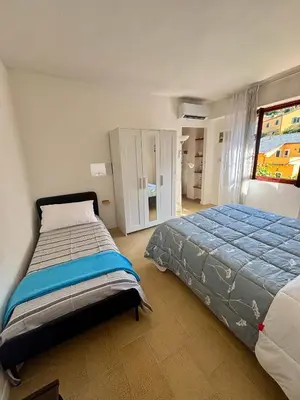 Letto o letti in una camera di La casetta di Tato