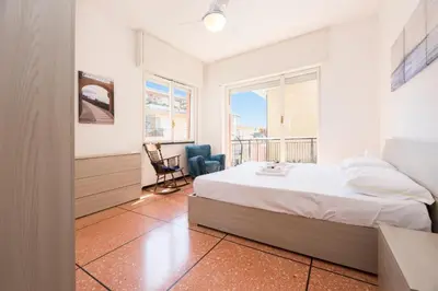 Letto o letti in una camera di JOIVY Pesto Home Holiday