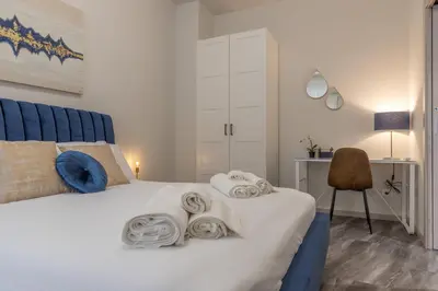Letto o letti in una camera di Suite Da Vinci
