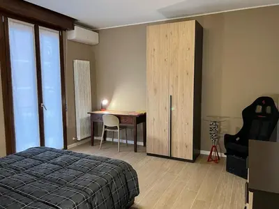 Letto o letti in una camera di Pit Stop In Maranello
