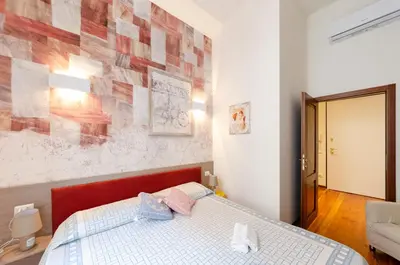 Letto o letti in una camera di JOIVY Bright 2BR flat with Parking in Rapallo Centre