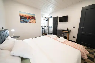 Letto o letti in una camera di La Torre Medievale - Storia e Comfort