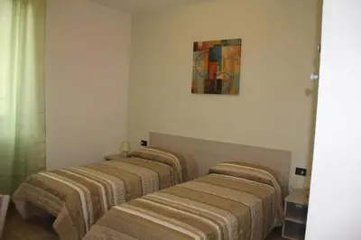 Letto o letti in una camera di Agriturismo A' Taversa