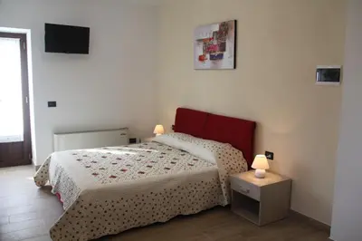 Letto o letti in una camera di Agriturismo A' Taversa