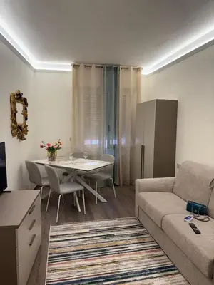 Area soggiorno di WELCOME RIVIERA-MAZZINI 30- Bagno e arredamenti nuovi- Centralissimo a 100 m dalle spiaggie-Parcheggio a 15 euro al giorno, da prenotare