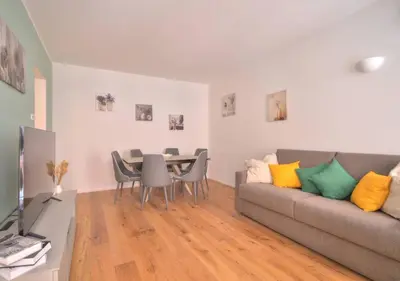 Area soggiorno di Salvia Flexyrent apartment AC