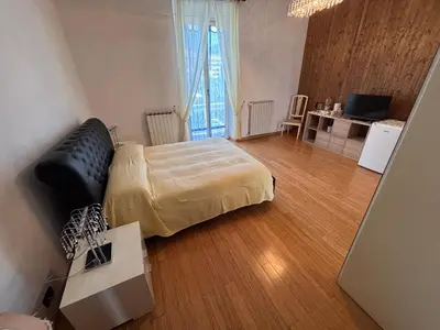 Letto o letti in una camera di Affittacamere IL Tulipano Sestri Levante