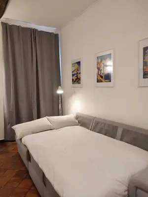 Letto o letti in una camera di Riviera 1683 - Centro storico e mare!