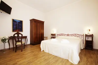 Letto o letti in una camera di La Madonetta - Dimora d'epoca -