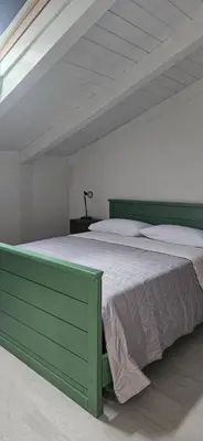 Letto o letti in una camera di Agriturismo Palazzo Vescia