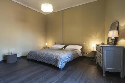 Letto o letti in una camera di La Pulce Argentata