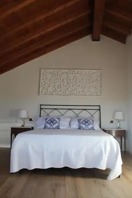 Letto o letti in una camera di Cà La Torre