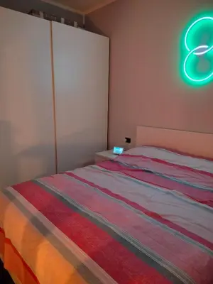 Letto o letti in una camera di House Family