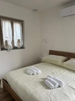 Letto o letti in una camera di House Holidays da Oneglia