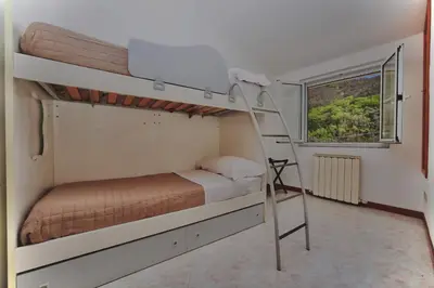 Letto o letti in una camera di Ardesia apartment