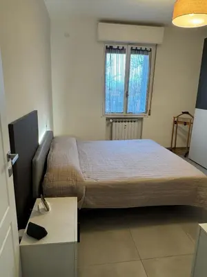 Letto o letti in una camera di Domus Plinio