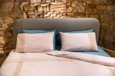 Letto o letti in una camera di Corte Finzi