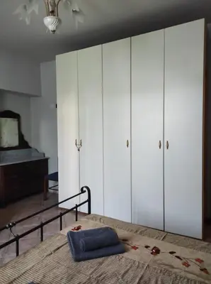 Letto o letti in una camera di Casa NONNA LINA