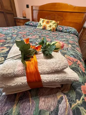 Letto o letti in una camera di Cozy HOUSE