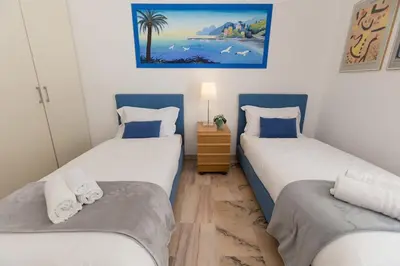 Letto o letti in una camera di Dimora degli Agrumi - 200m dal Mare con Terrazzo