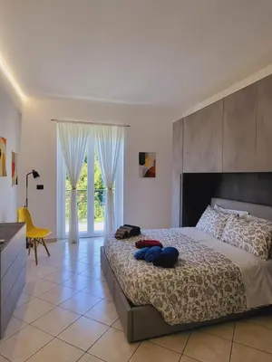 Letto o letti in una camera di Casa Dolce Casa, a 10 minuti dal mare