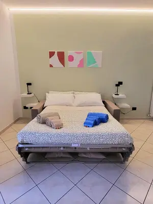 Letto o letti in una camera di Casa Dolce Casa, a 10 minuti dal mare