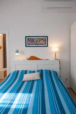 Letto o letti in una camera di La Casa dei Mandarini