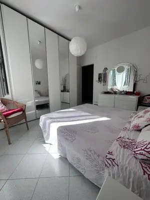 Letto o letti in una camera di Appartament Victoria between sea and 5 lands
