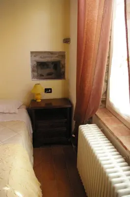 Letto o letti in una camera di Locanda di Campagna