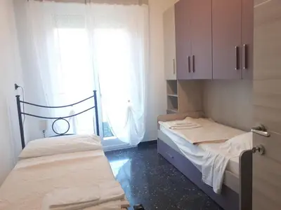 Letto o letti in una camera di Ferienwohnungen Moneglia & Cinque Terre