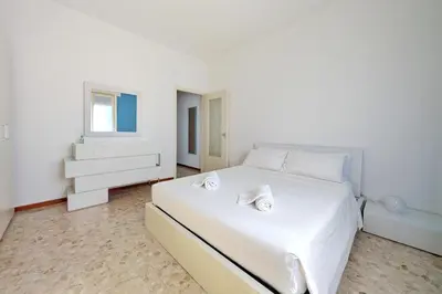Letto o letti in una camera di Casa Vacanze Crema