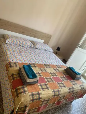 Letto o letti in una camera di Mantova sweet home