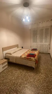 Letto o letti in una camera di Mantova sweet home