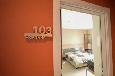 Letto o letti in una camera di Locanda Parsifal