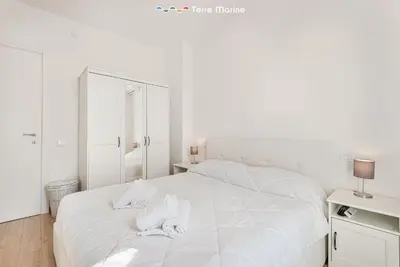 Letto o letti in una camera di Cherry, Terre Marine