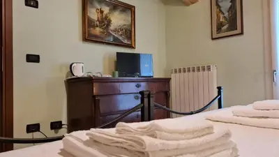 Letto o letti in una camera di Foresteria due Galli